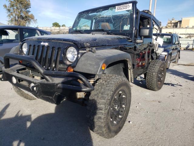 Photo 2 from auction – 2011 JEEP WRANGLER R with VIN 1J4BA6D13BL536089