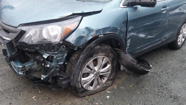 Photo 9 from auction – 2014 HONDA CR-V EXL with VIN 2HKRM4H76EH604134