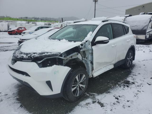 Photo 2 from auction – 2018 TOYOTA RAV4 LE with VIN 2T3BFREV8JW758293