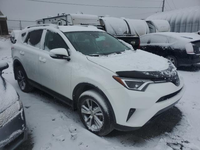 TOYOTA RAV4 LE 2018 with VIN 2T3BFREV8JW758293 - Photo from auction