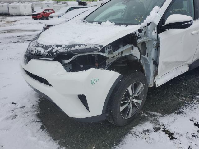 Photo 9 from auction – 2018 TOYOTA RAV4 LE with VIN 2T3BFREV8JW758293