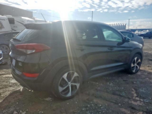 Photo 4 from auction – 2016 HYUNDAI TUCSON LIM with VIN KM8J3CA25GU082707