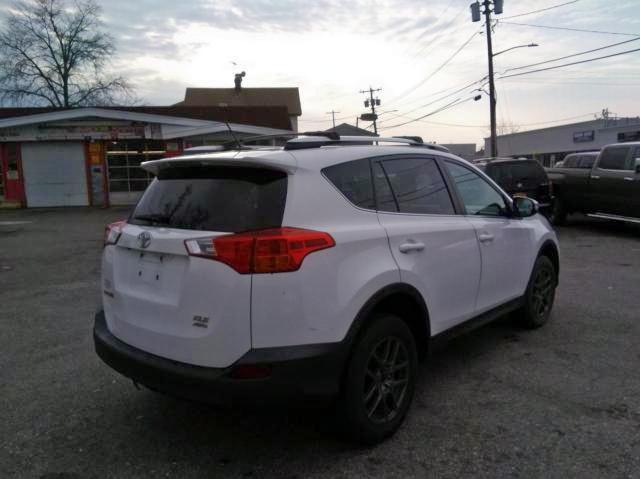 Photo 4 from auction – 2015 TOYOTA RAV4 XLE with VIN 2T3RFREV9FW231577