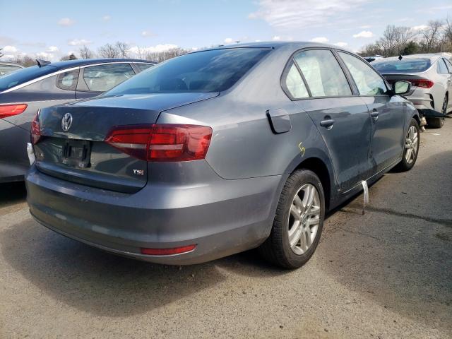 Photo 4 from auction – 2018 VOLKSWAGEN JETTA S with VIN 3VW2B7AJXJM260467