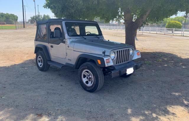 JEEP WRANGLER / 2000 with VIN 1J4FA29P9YP754823 - Photo from auction
