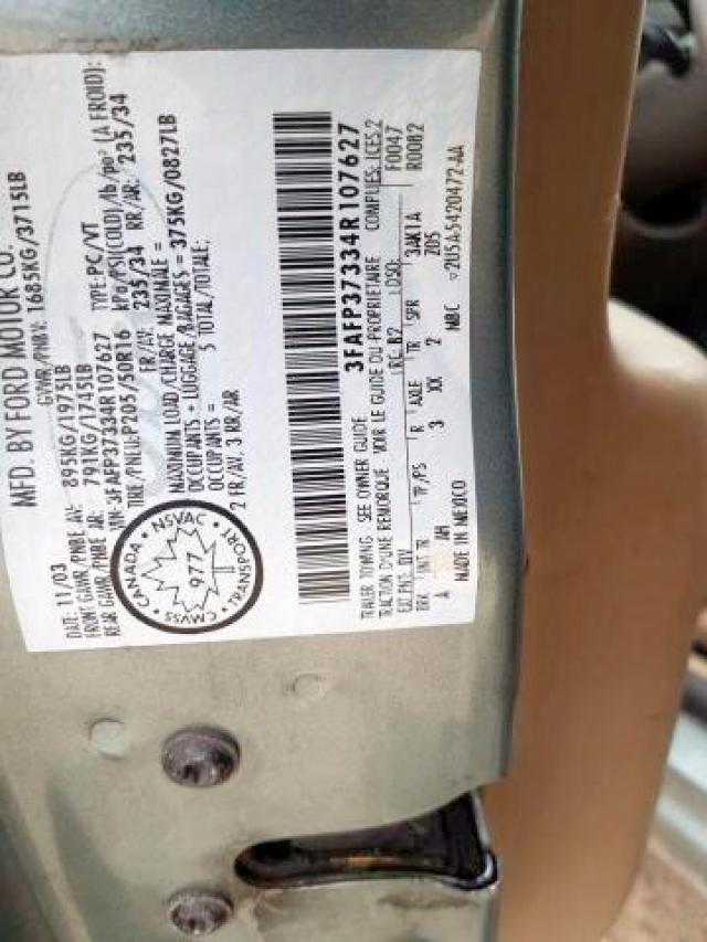 Photo 9 from auction – 2004 FORD FOCUS ZX5 with VIN 3FAFP37334R107627