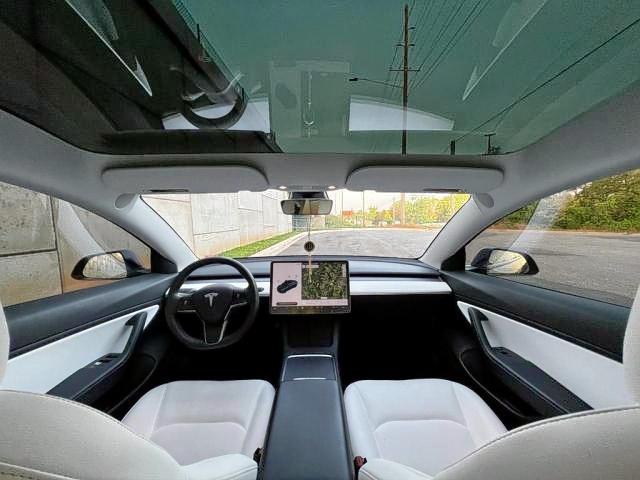 Photo 9 from auction – 2021 TESLA MODEL 3 with VIN 5YJ3E1EA6MF838269