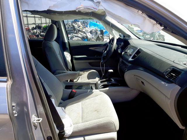 Photo 5 from auction – 2020 HONDA PILOT LX with VIN 5FNYF5H18LB022278