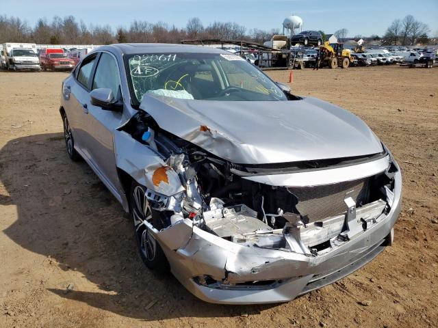HONDA CIVIC EX 2018 with VIN JHMFC1F36JX020611 - Photo from auction