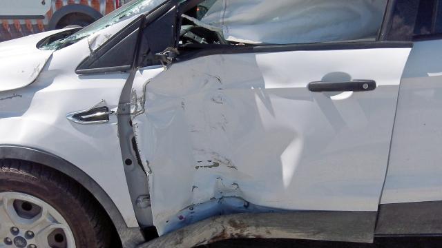 Photo 9 from auction – 2017 FORD ESCAPE S with VIN 1FMCU9FD4HUE26581