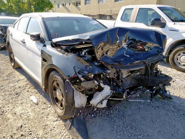 FORD TAURUS POL 2015 with VIN 1FAHP2MK5FG159768 - Photo from auction