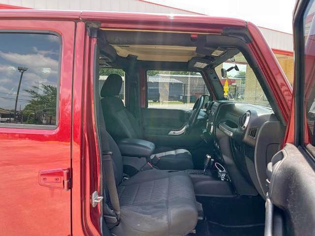 Photo 5 from auction – 2011 JEEP WRANGLER U with VIN 1J4BA5H14BL561474