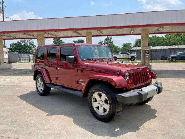 JEEP WRANGLER U 2011 with VIN 1J4BA5H14BL561474 - Photo from auction