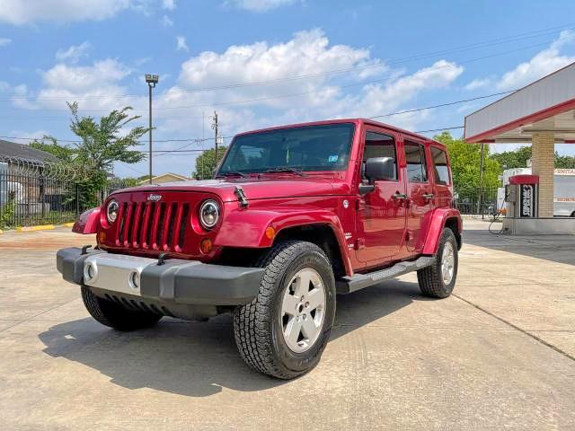 Photo 2 from auction – 2011 JEEP WRANGLER U with VIN 1J4BA5H14BL561474