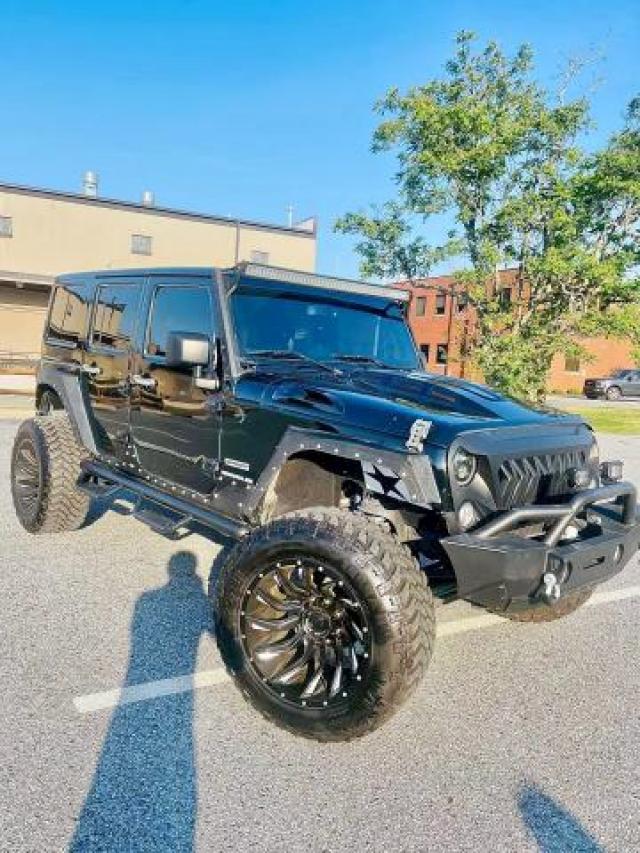 JEEP WRANGLER U 2017 with VIN 1C4HJWDGXHL506486 - Photo from auction
