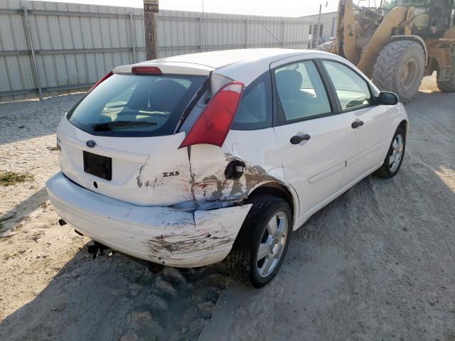 Photo 4 from auction – 2004 FORD FOCUS ZX5 with VIN 3FAHP373X4R124501