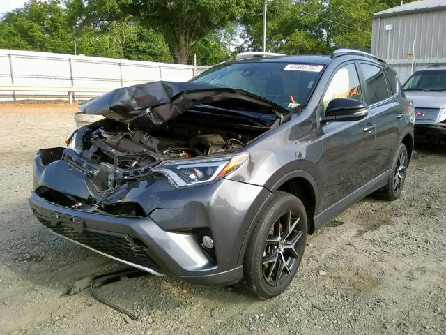 Photo 2 from auction – 2018 TOYOTA RAV4 SE with VIN JTMJFREV3JD233442
