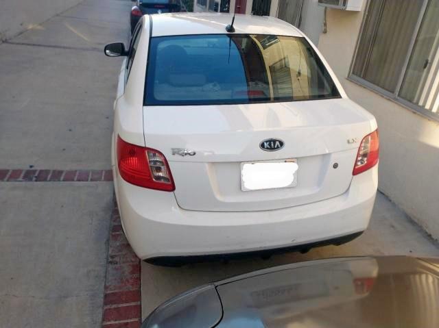 Photo 3 from auction – 2010 KIA RIO LX with VIN KNADH4A31A6692128