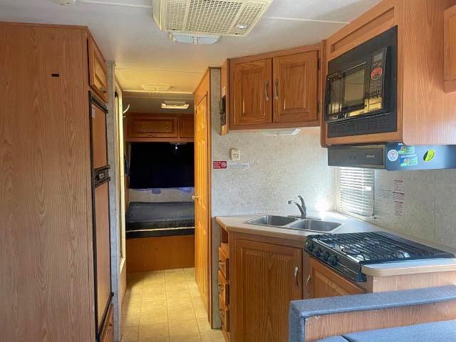 Photo 5 from auction – 2005 FORD ECONOLINE with VIN 1FDXE45SX5HB41843