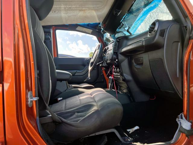 Photo 5 from auction – 2011 JEEP WRANGLER U with VIN 1J4BA3H15BL586582