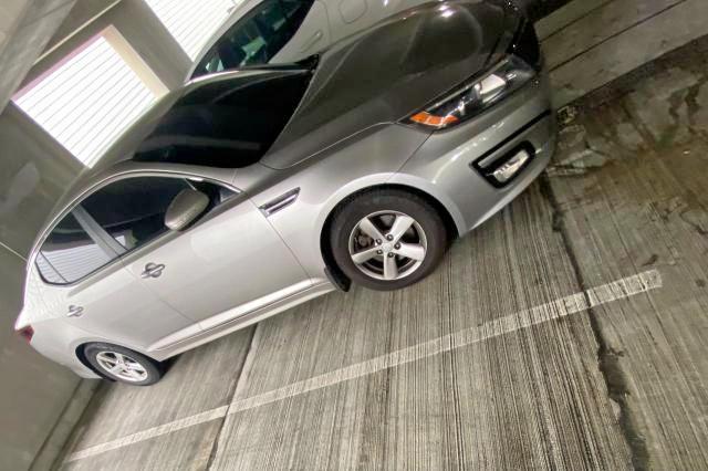 KIA OPTIMA LX 2015 with VIN KNAGM4A74F5588399 - Photo from auction