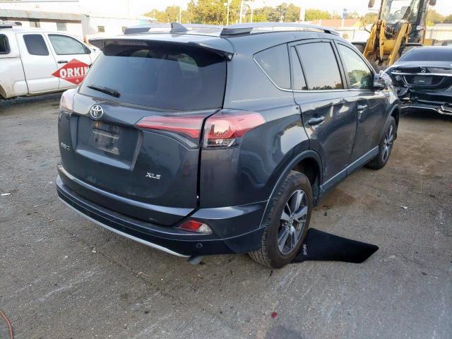 Photo 4 from auction – 2016 TOYOTA RAV4 XLE with VIN JTMWFREV0GD087385
