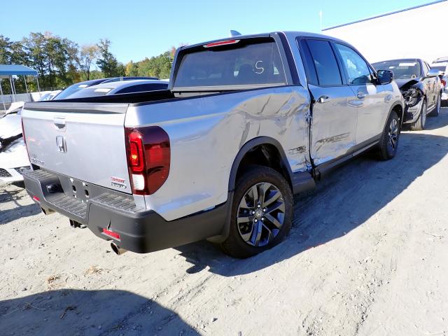 Photo 4 from auction – 2021 HONDA RIDGELINE with VIN 5FPYK3F11MB011005