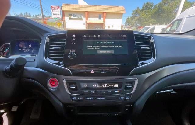Photo 9 from auction – 2021 HONDA PASSPORT E with VIN 5FNYF8H50MB028338