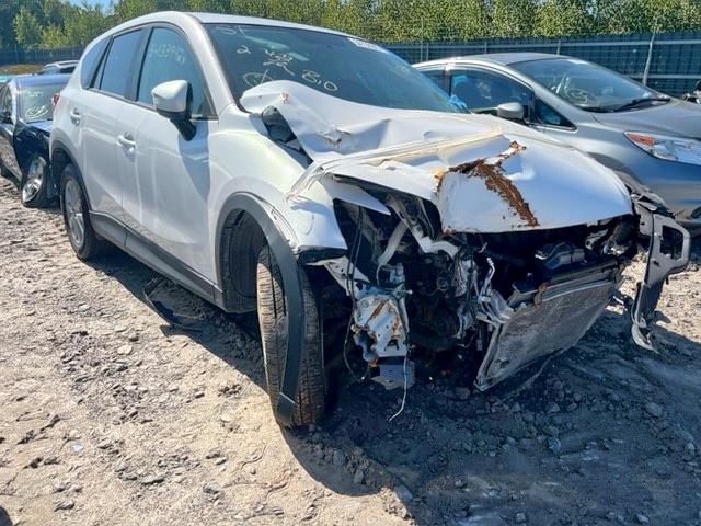 MAZDA CX-5 TOURI 2016 with VIN JM3KE4CY6G0695802 - Photo from auction
