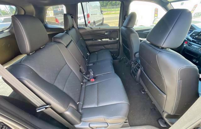 Photo 6 from auction – 2021 HONDA PASSPORT E with VIN 5FNYF8H50MB028338