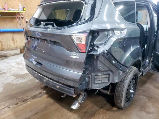Photo 9 from auction – 2018 FORD ESCAPE SEL with VIN 1FMCU9HDXJUA63397