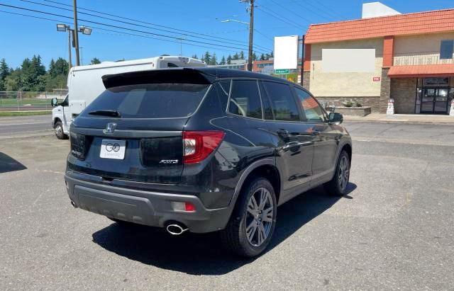 Photo 4 from auction – 2021 HONDA PASSPORT E with VIN 5FNYF8H50MB028338