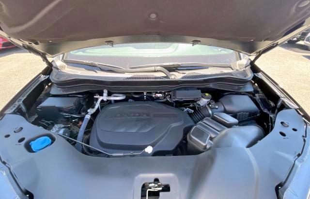 Photo 7 from auction – 2021 HONDA PASSPORT E with VIN 5FNYF8H50MB028338