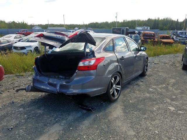 Photo 4 from auction – 2014 FORD FOCUS S with VIN 1FADP3E28EL328531