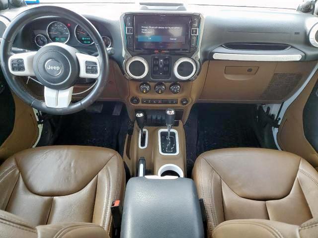 Photo 5 from auction – 2014 JEEP WRANGLER U with VIN 1C4BJWFG0EL231063