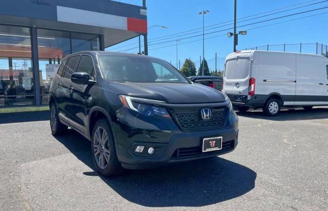 HONDA PASSPORT E 2021 with VIN 5FNYF8H50MB028338 - Photo from auction