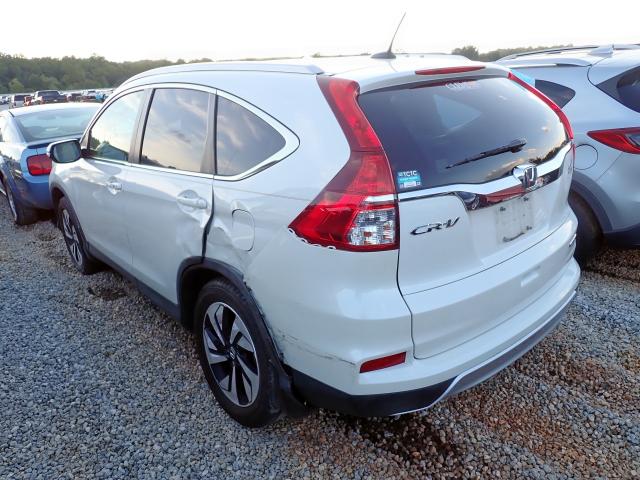 Photo 3 from auction – 2015 HONDA CR-V TOURI with VIN 5J6RM3H97FL010042