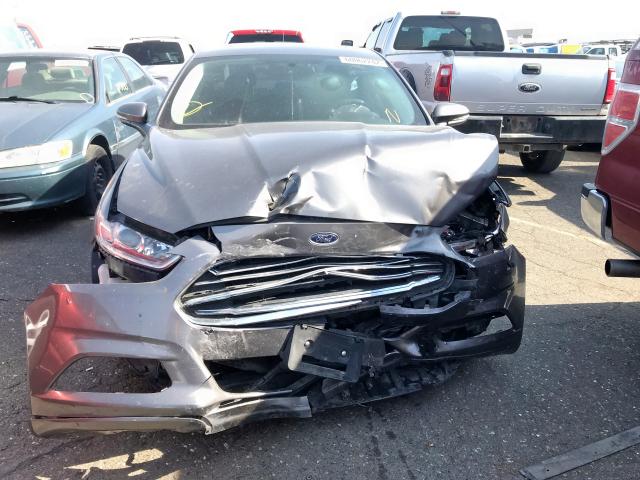 Photo 7 from auction – 2014 FORD FUSION SE with VIN 3FA6P0HD1ER142075