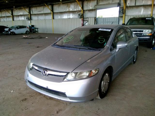 Photo 2 from auction – 2006 HONDA CIVIC HYBR with VIN JHMFA36276S022073