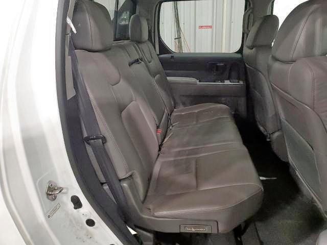Photo 6 from auction – 2014 HONDA RIDGELINE with VIN 5FPYK1F58EB009387