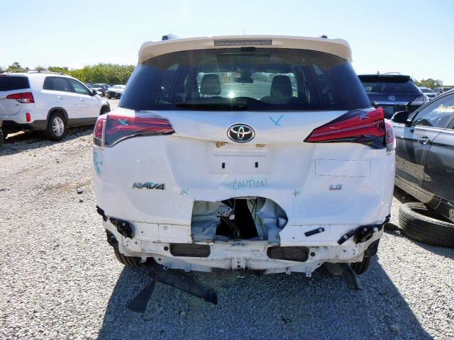 Photo 9 from auction – 2018 TOYOTA RAV4 LE with VIN JTMZFREV1JJ201934