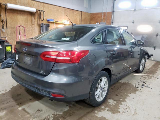 Photo 4 from auction – 2015 FORD FOCUS SE with VIN 1FADP3F26FL220604