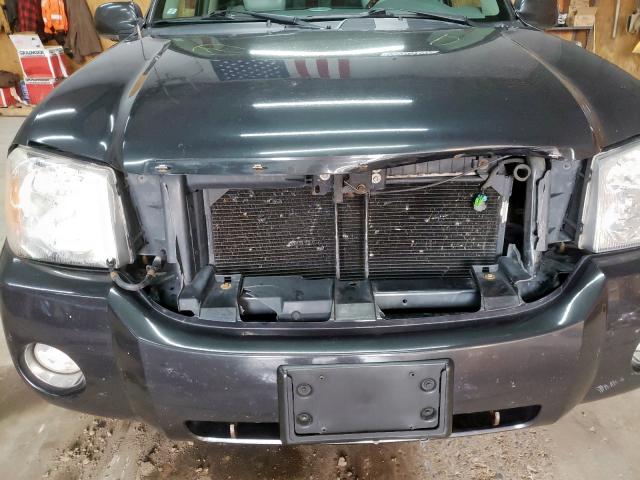 Photo 9 from auction – 2006 GMC ENVOY DENA with VIN 1GKET63M762294187