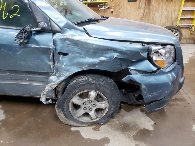 Photo 9 from auction – 2006 HONDA PILOT EX with VIN 2HKYF18496H530963