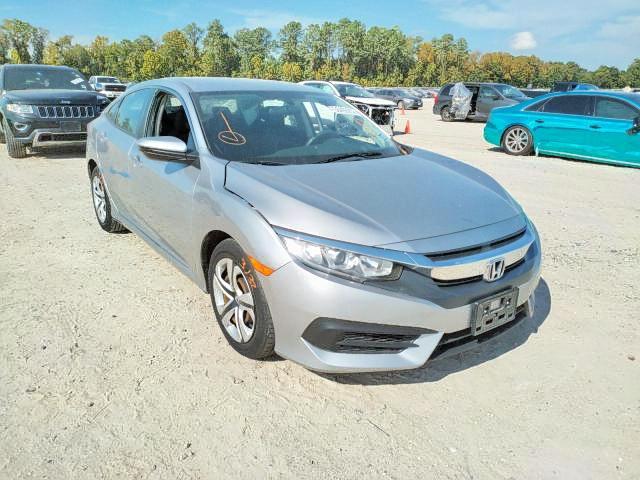 HONDA CIVIC LX 2018 with VIN 19XFC2F54JE029431 - Photo from auction