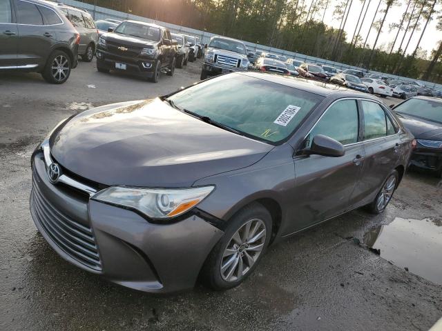 TOYOTA CAMRY LE 2015 with VIN 4T1BF1FK0FU049170 - Photo from auction