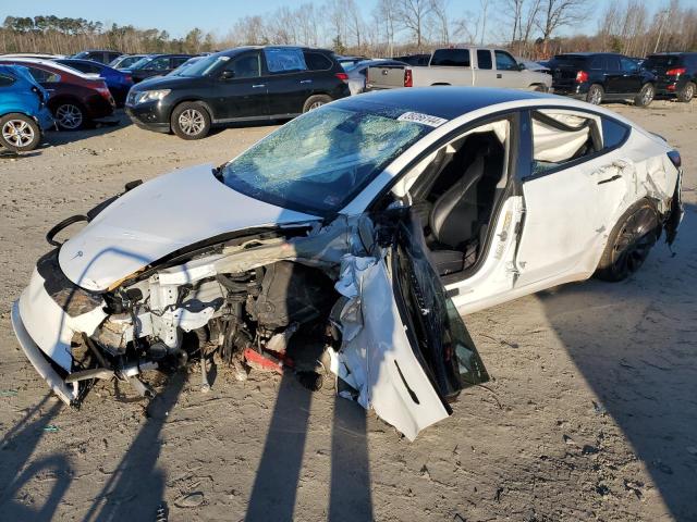 TESLA MODEL 3 2021 with VIN 5YJ3E1EC0MF856333 - Photo from auction