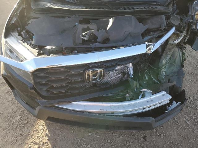 Photo 11 from auction – 2022 HONDA PASSPORT E with VIN 5FNYF7H53NB005129