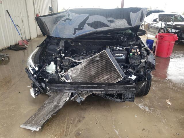 Photo 5 from auction – 2018 KIA FORTE LX with VIN 3KPFL4A79JE257025