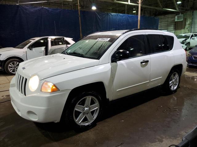 JEEP COMPASS SP 2009 with VIN 1J4FF47B99D233589 - Photo from auction